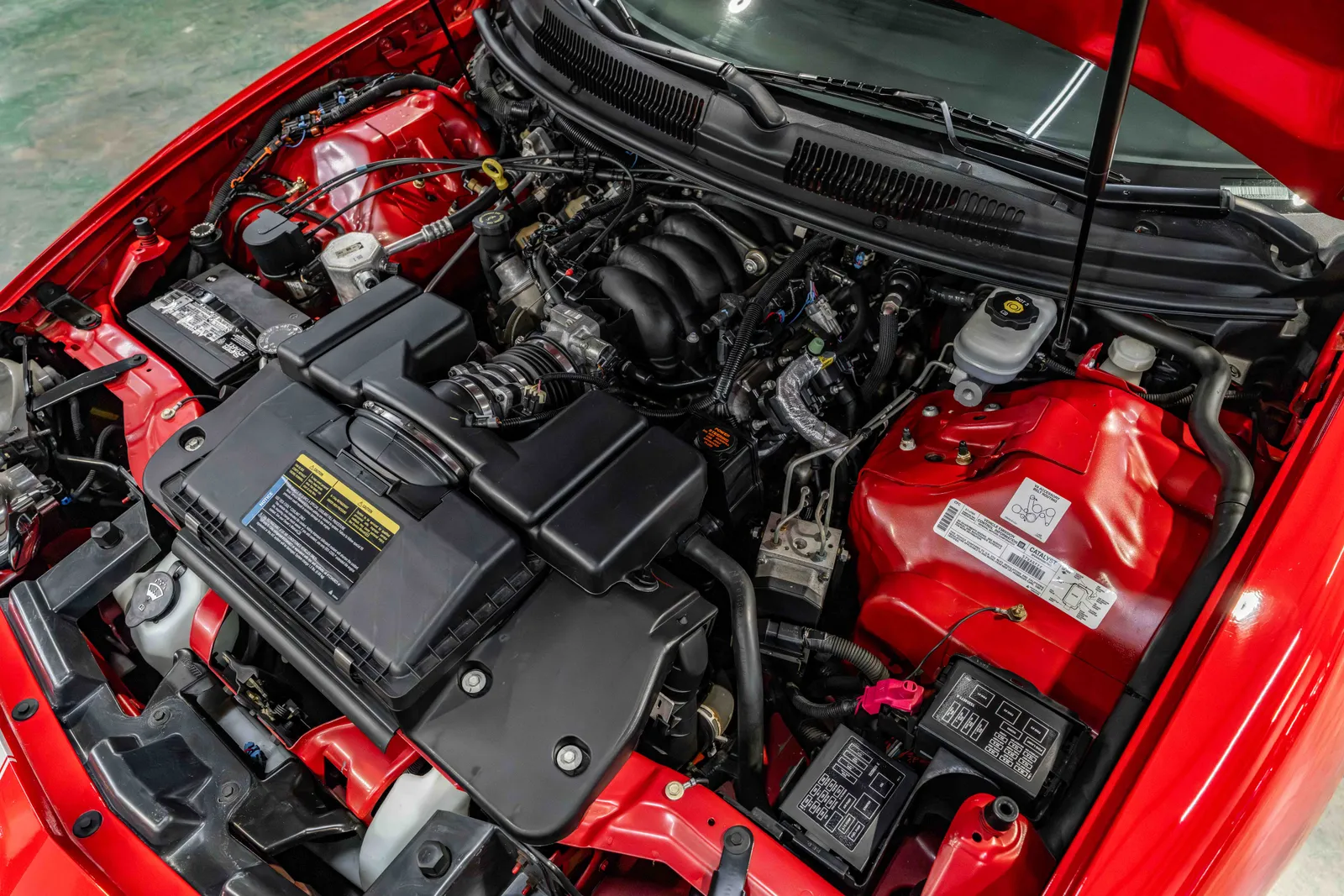11_2002-Chevrolet-Camaro-Bright Rally Red-138899-46.jpg